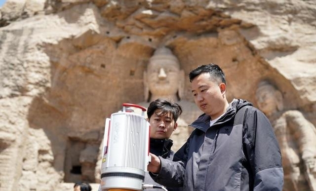 山西大同云冈石窟图片(是谁为云冈石窟留住花样年华）